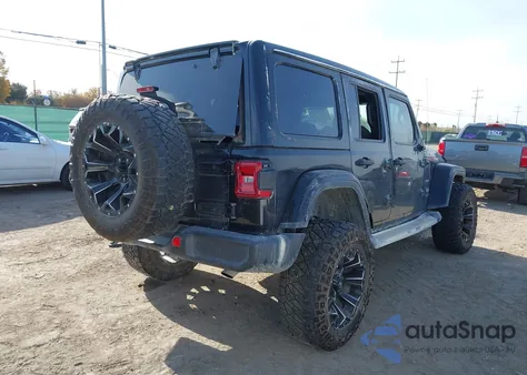 2019 Jeep Wrangler Unlimited Sahara из США, поврежденный, VIN 1C4HJXEN7KW685496